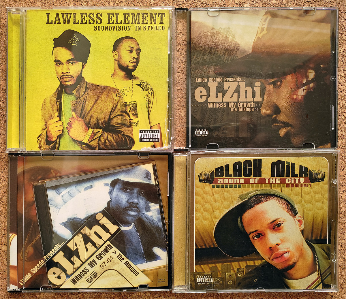 Four Detroit hip-hop music CD's, eLZhi, Lawless Element & Black Milk.