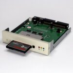 Front view of CF Card reader for Akai MPC 2000XL, card partially inserted.